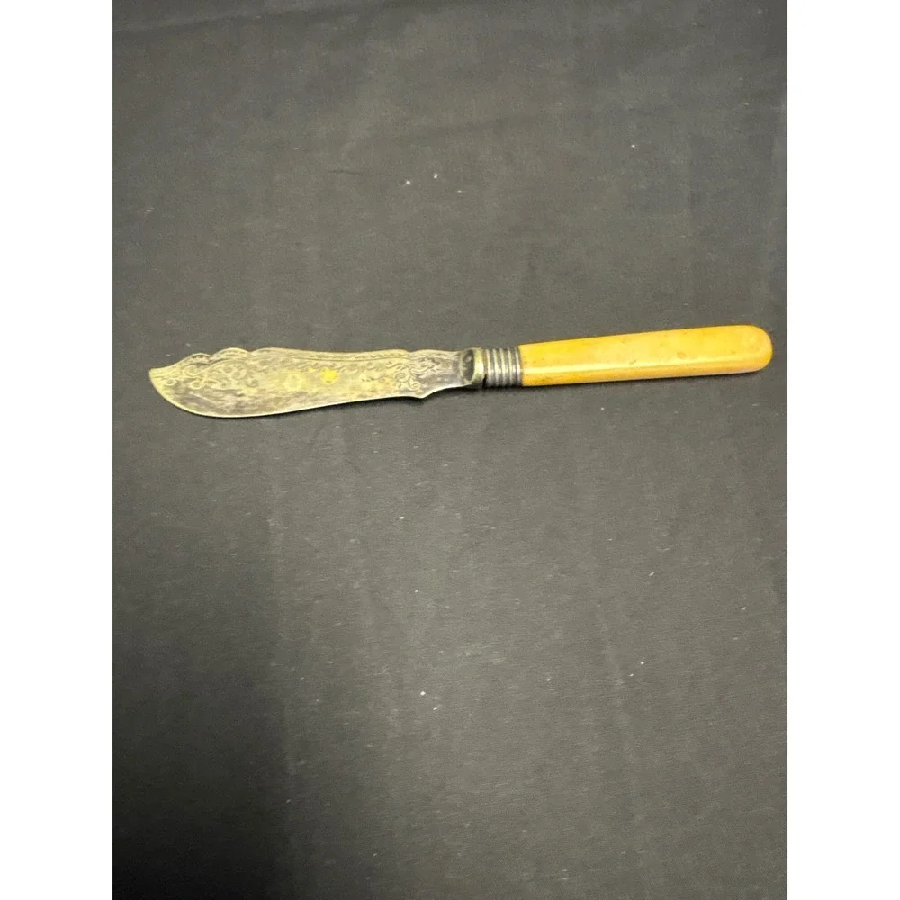 Antique Ornate Etched Butter Knife Scalloped Blade Butterscotch Handle 7.75 in